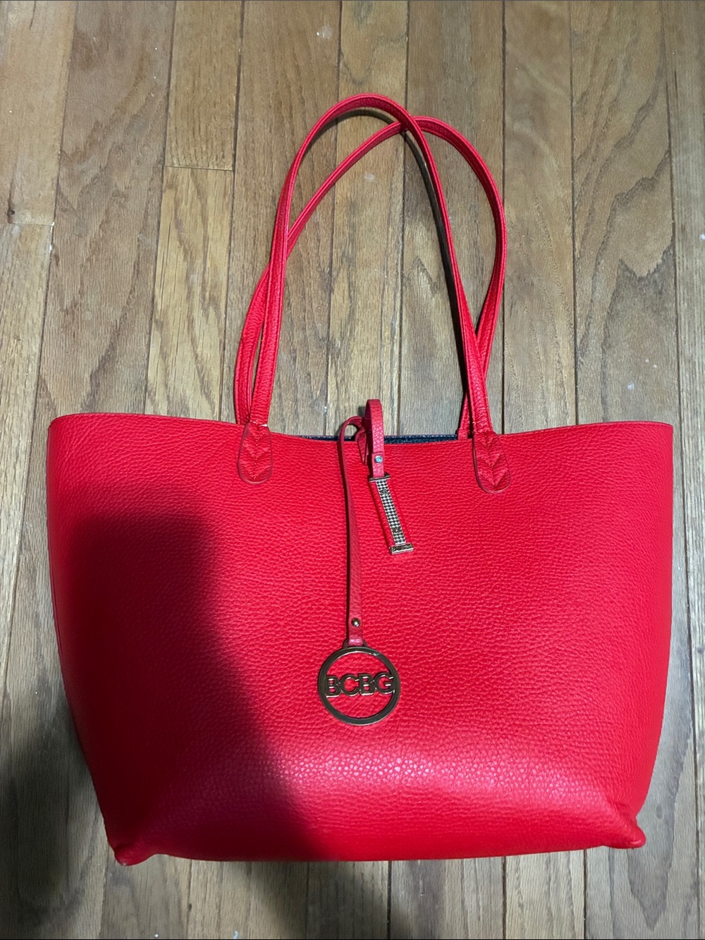 BCBG Red Pebbled Leather Tote with Logo Charm